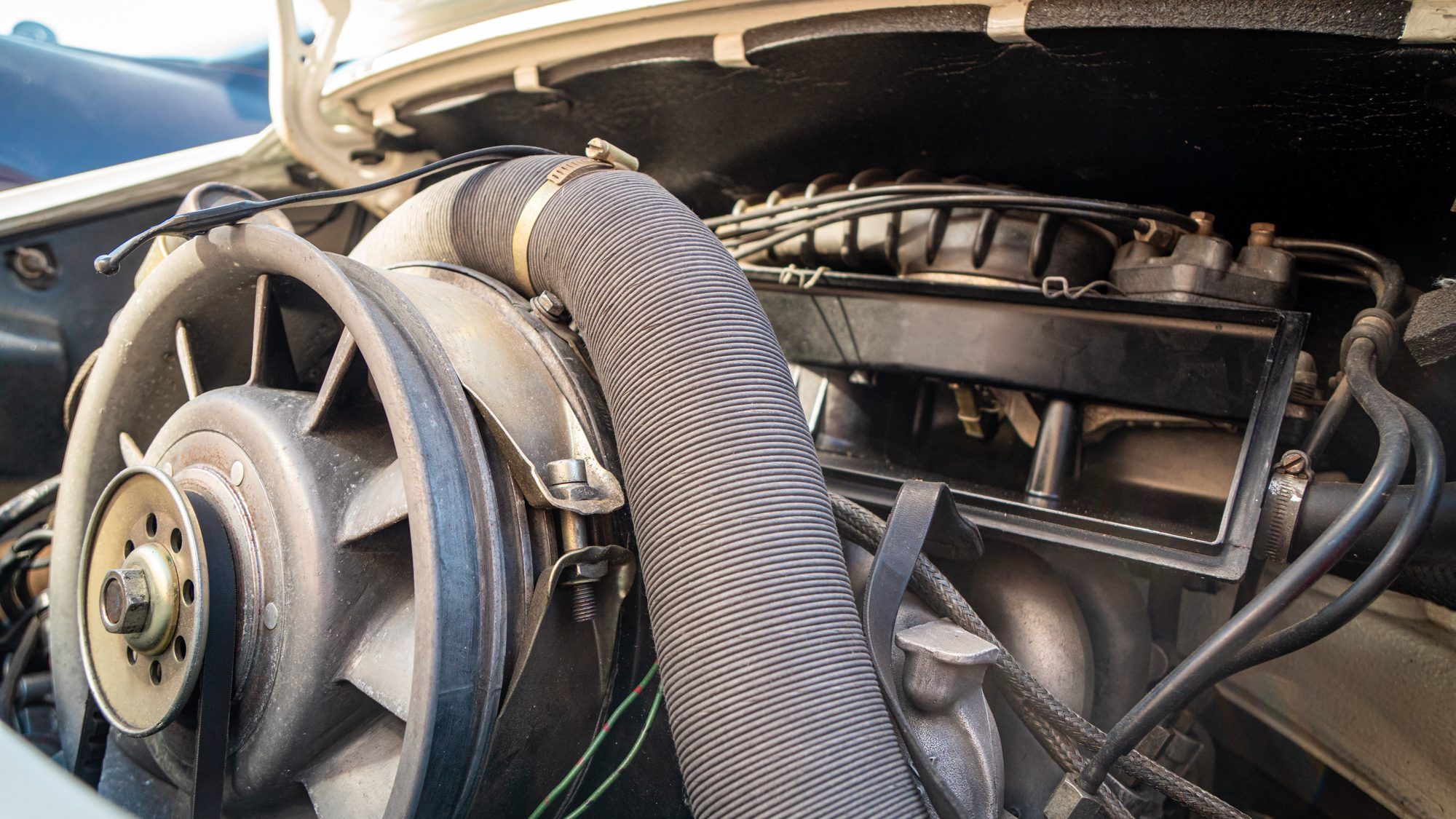Air-cooled Porsche engine bay with the cooling fan