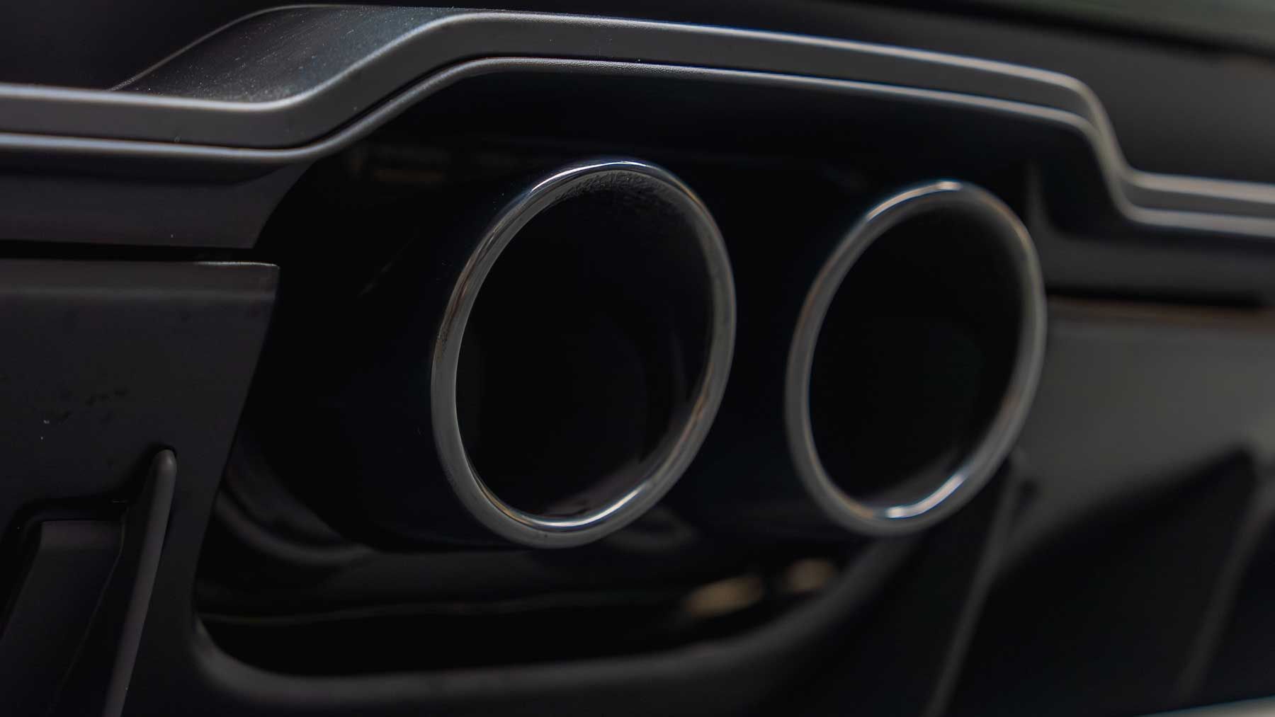 Twin tailpipes of a Porsche Sports Exhaust