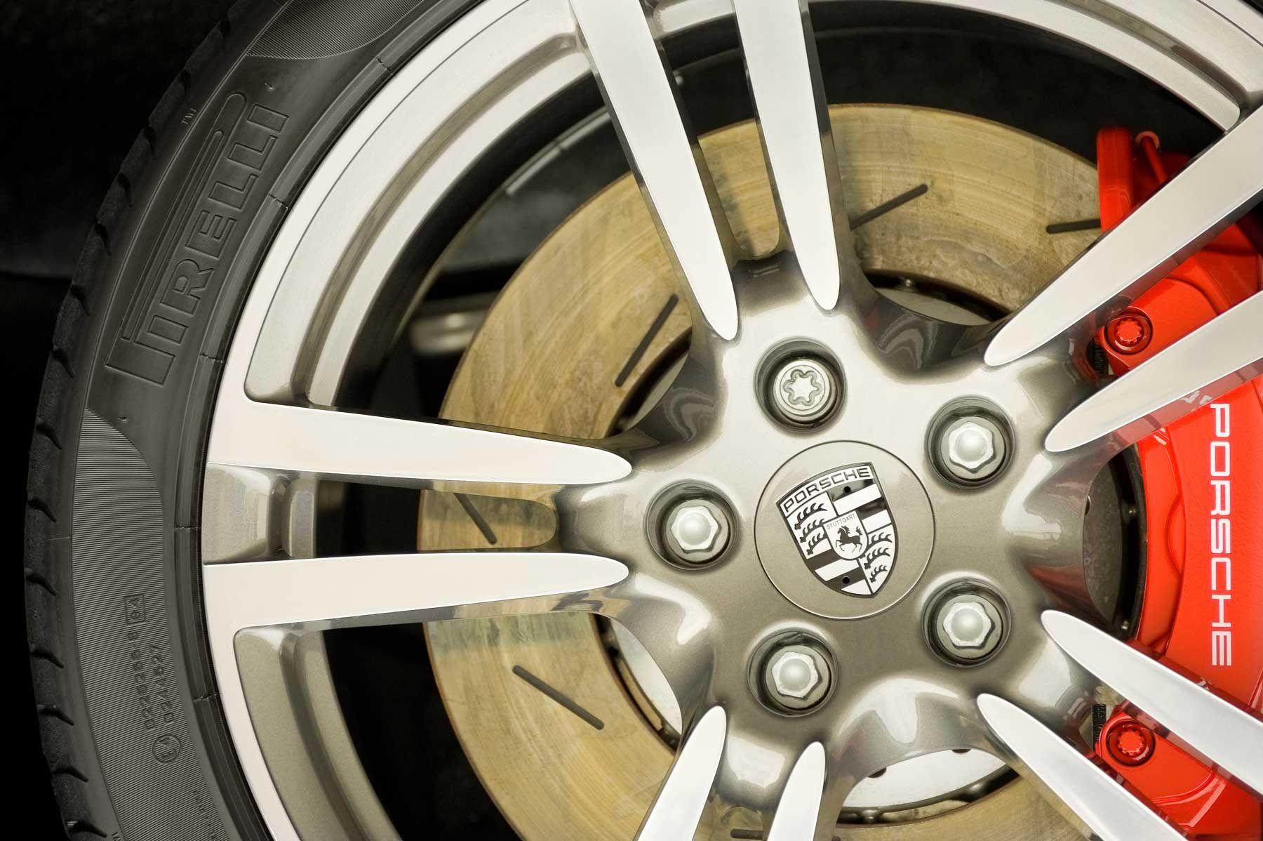 Porsche alloy wheel with crest centre cap