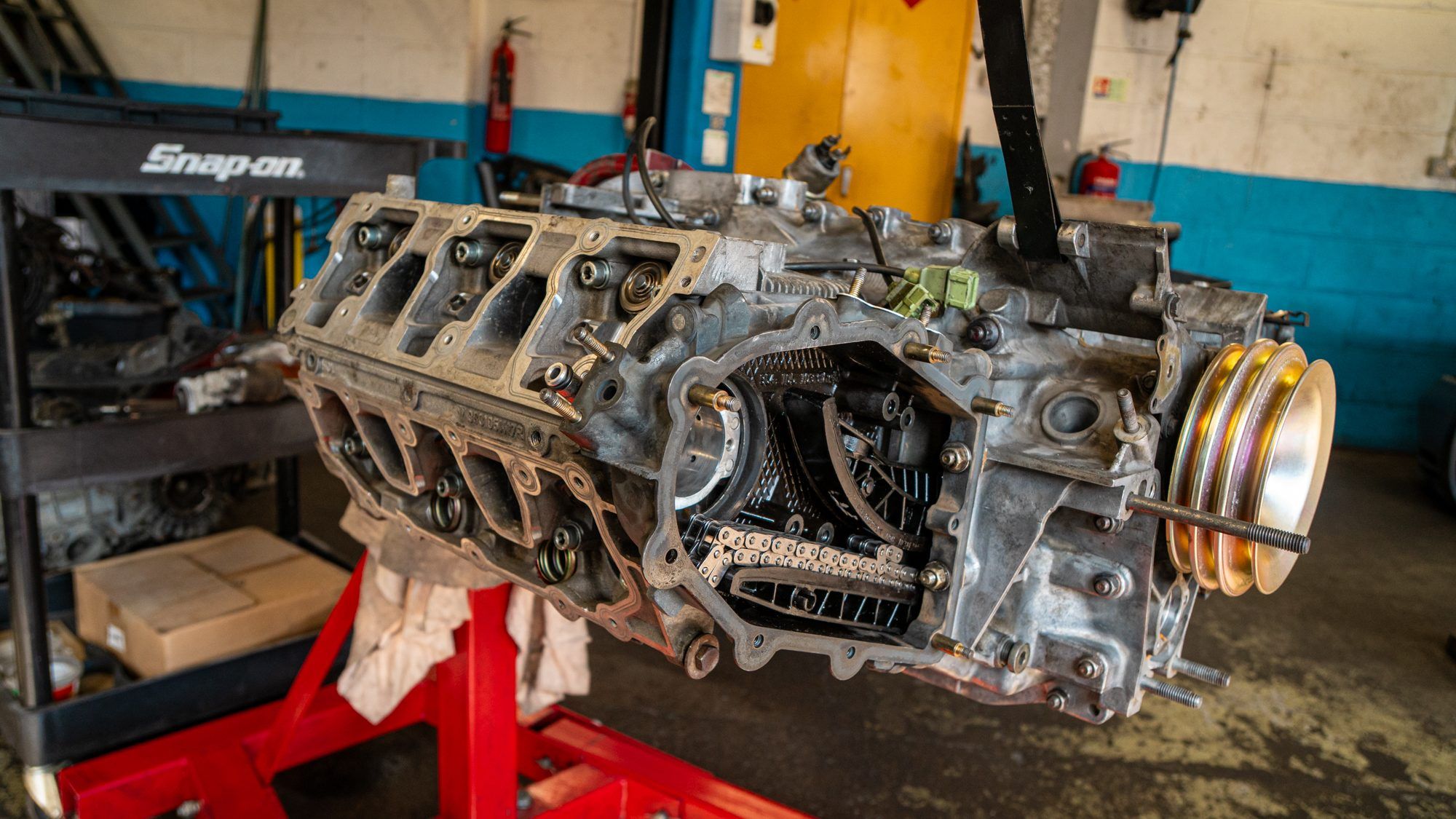 Porsche engine block mounted on an engine stand