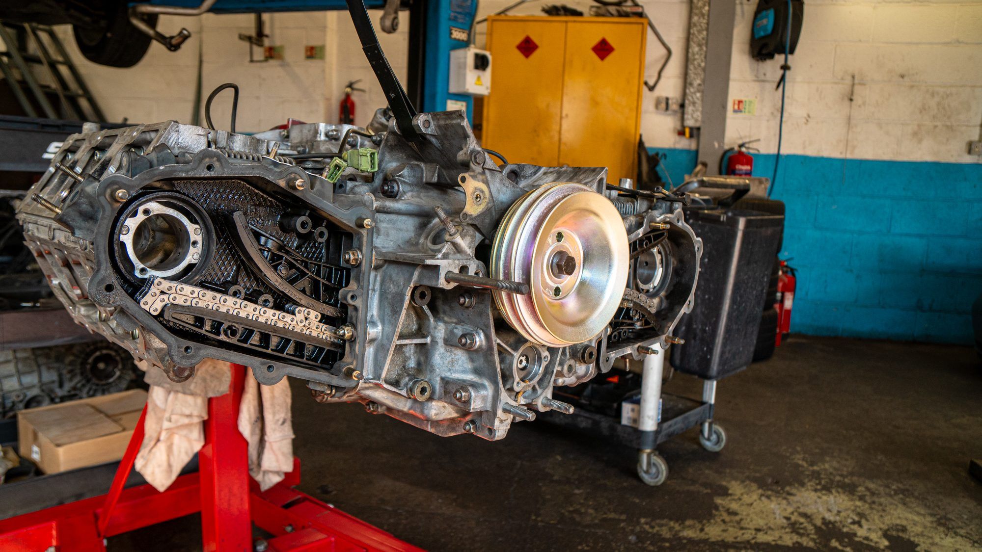 Porsche flat-six engine on a stand during a rebuild