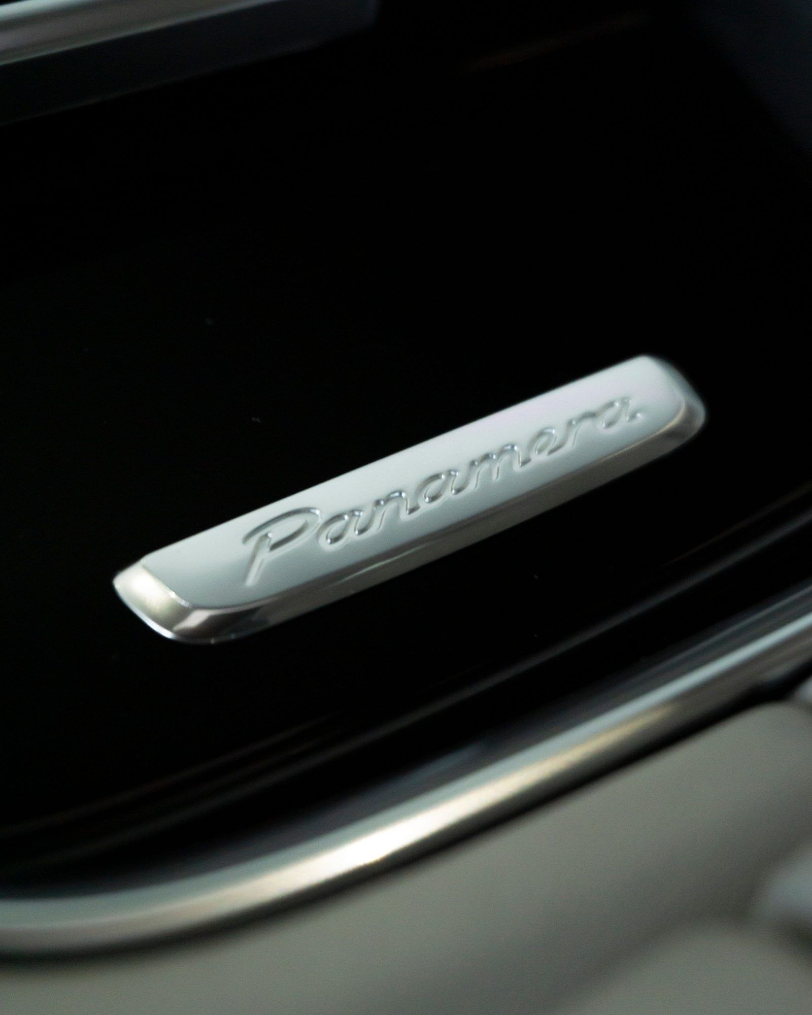 Panamera script on the door sill of a Porsche Panamera
