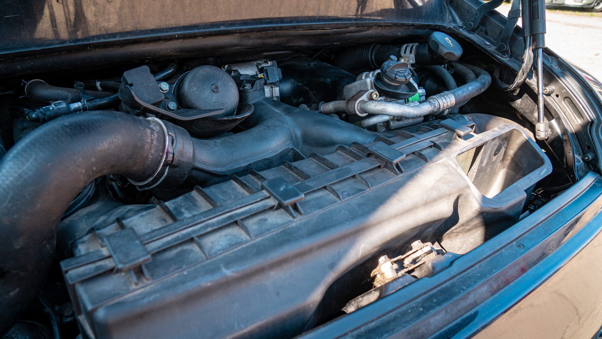 Engine bay of a water-cooled Porsche 911