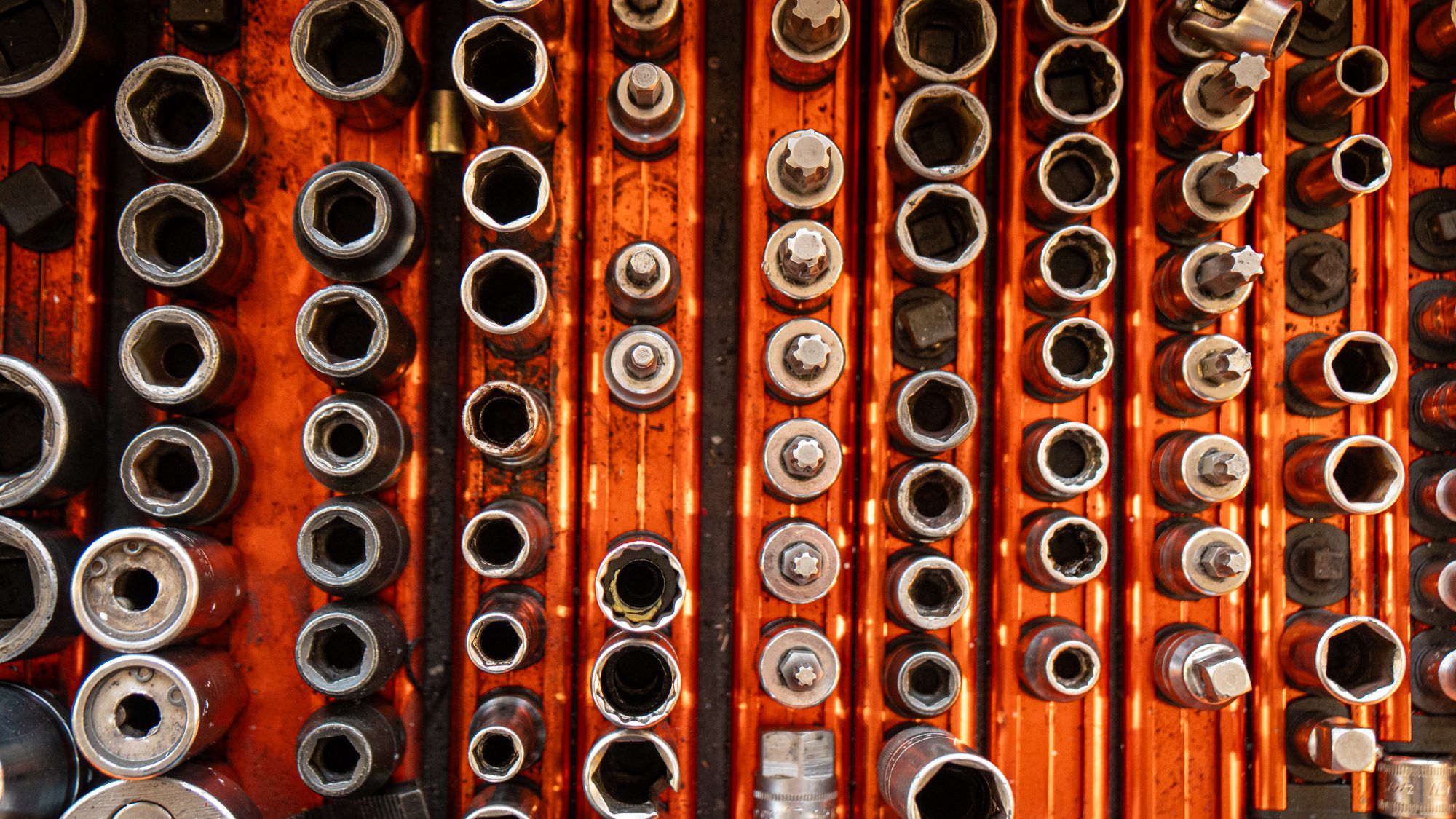 Rows of sockets on a rack in the workshop