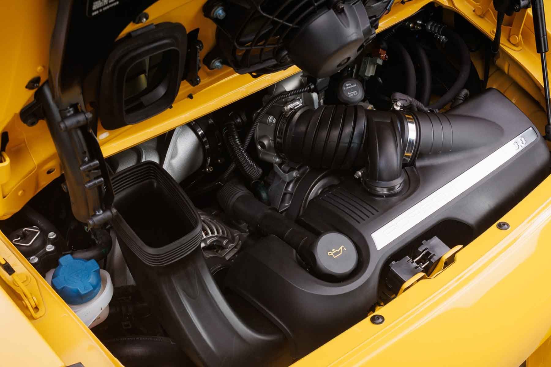 Engine bay of a yellow Porsche